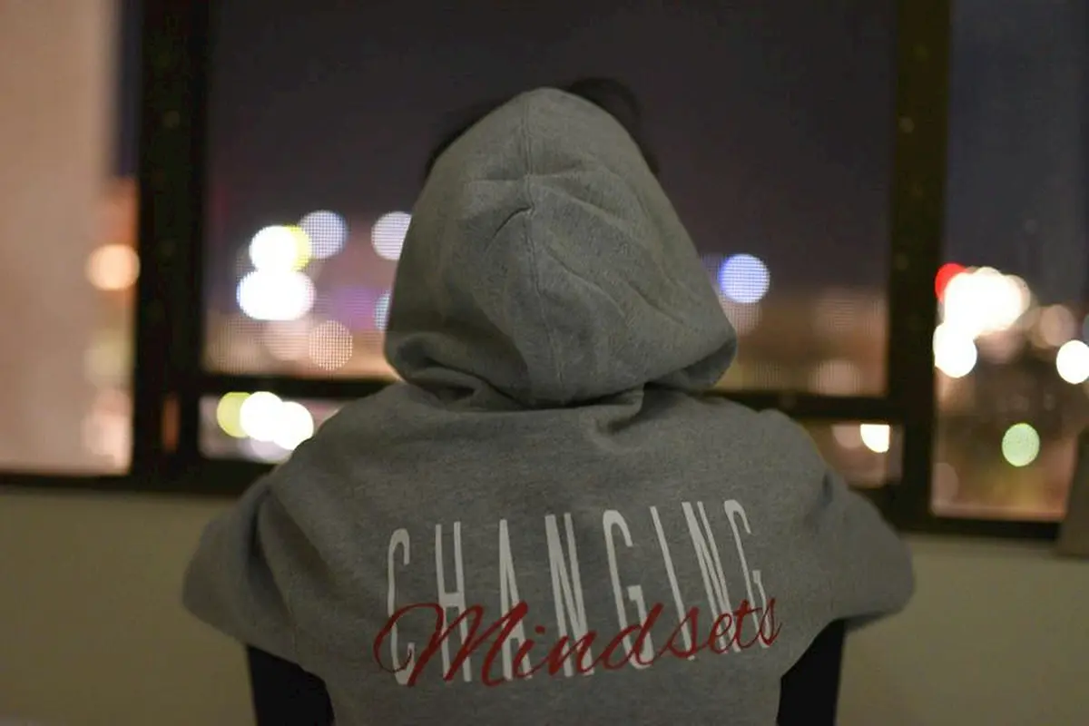 changing mindset written on the back of a hoodie